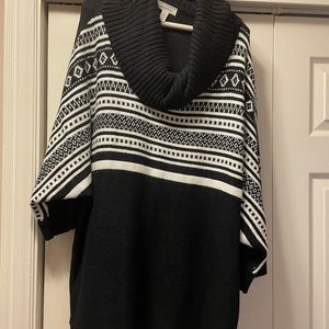 Sweater with black and white stripes